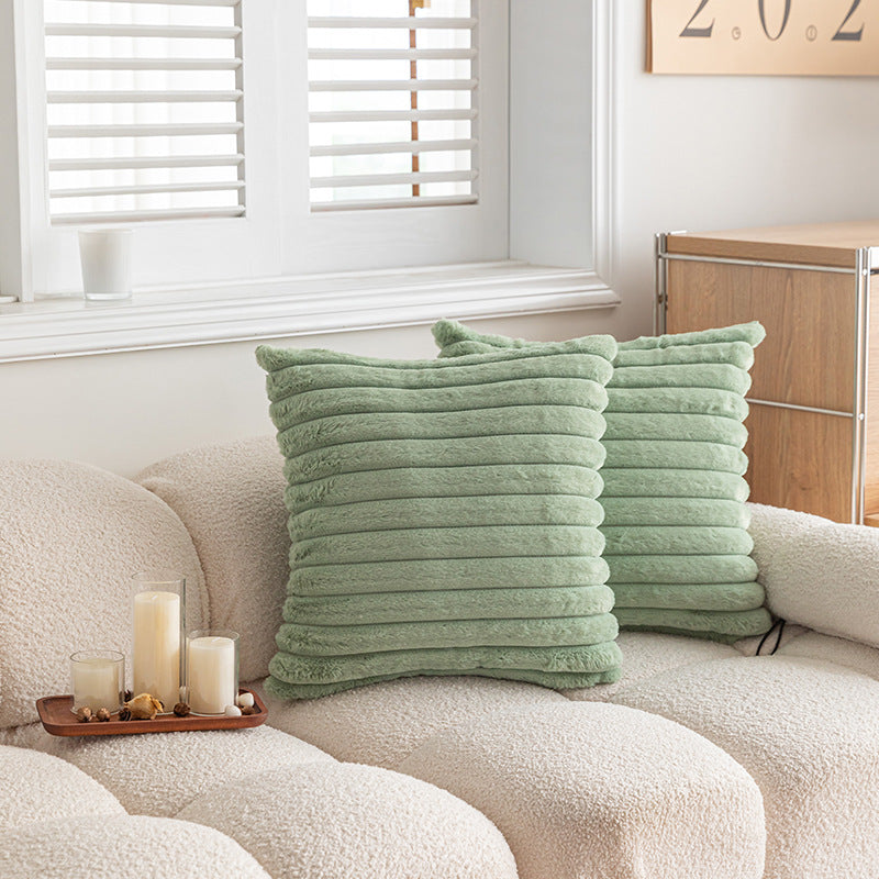 Housse de coussin rayée en fausse fourrure