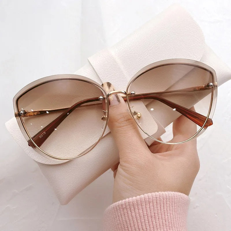 AnnaShade - Lunettes de soleil ovales sans monture élégantes