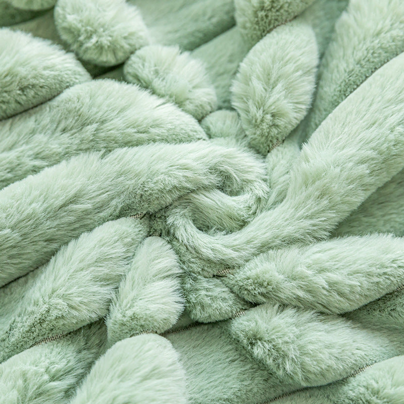 Housse de coussin rayée en fausse fourrure