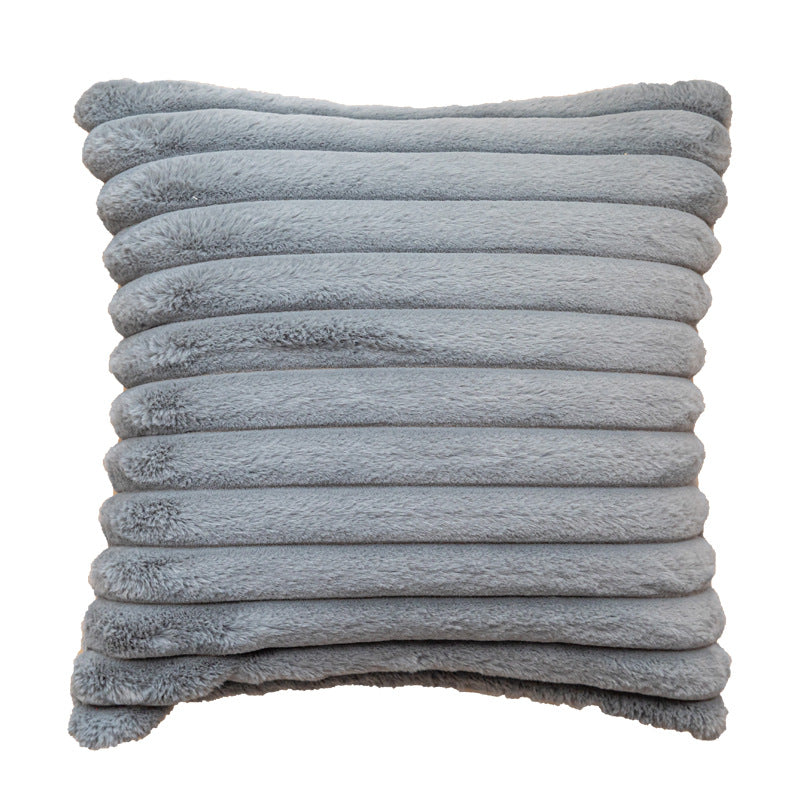Housse de coussin rayée en fausse fourrure