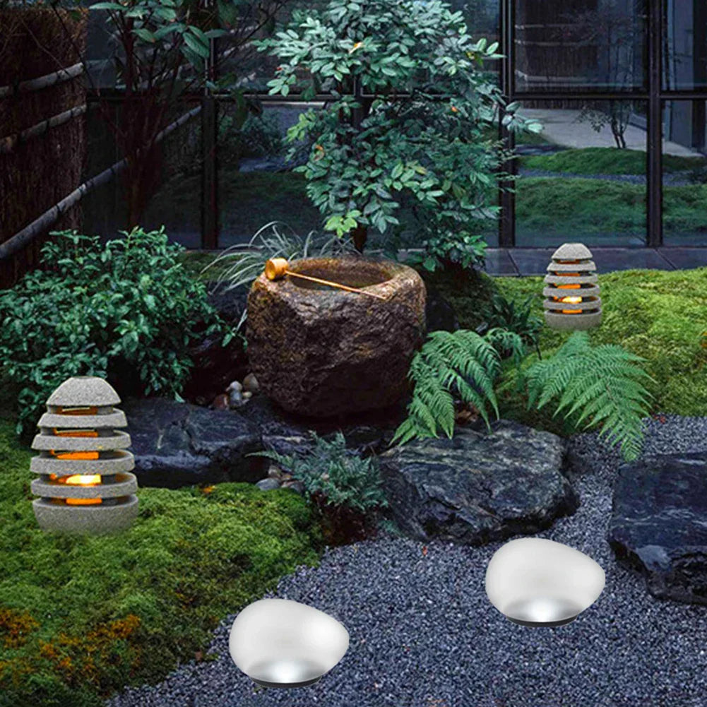 Floroux – Lampes à galets solaires pour une atmosphère de jardin