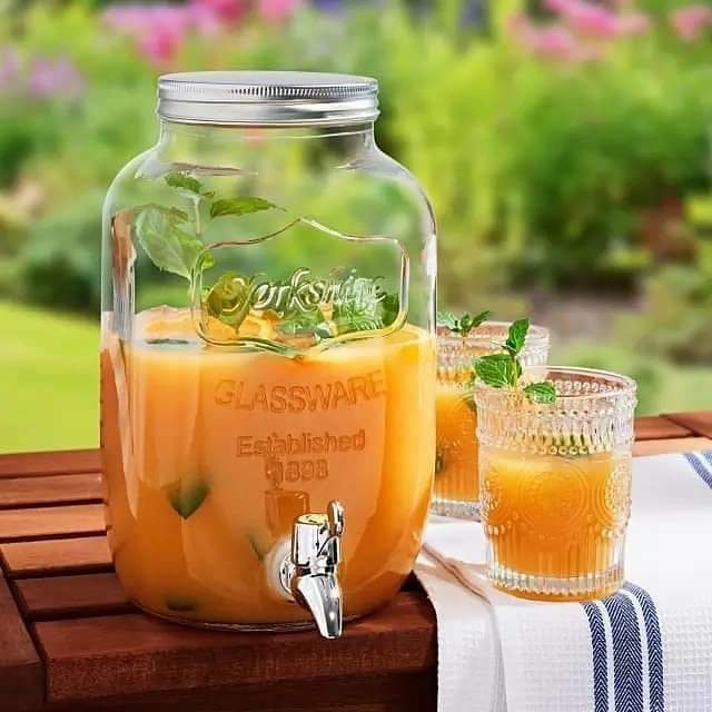 Distributeur de jus en verre