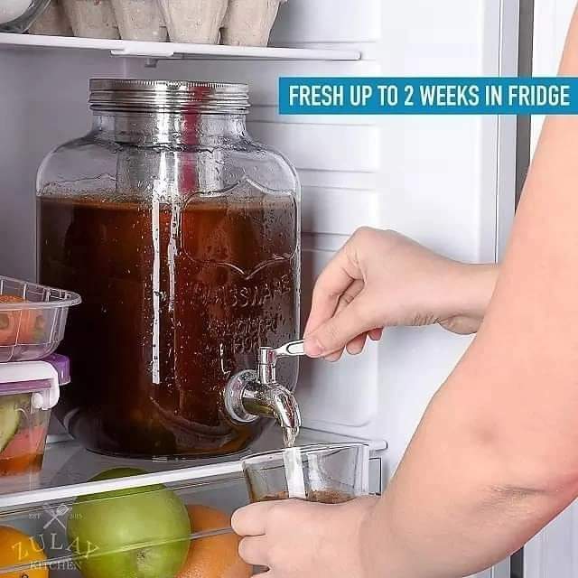 Distributeur de jus en verre
