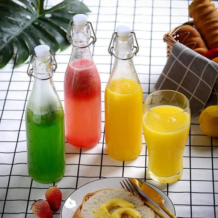 Bouteilles en verre à boisson avec couvercles à clip