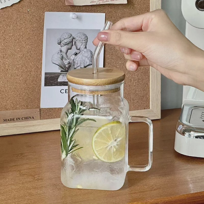 Mug en verre élégant avec poignée, couvercle et paille