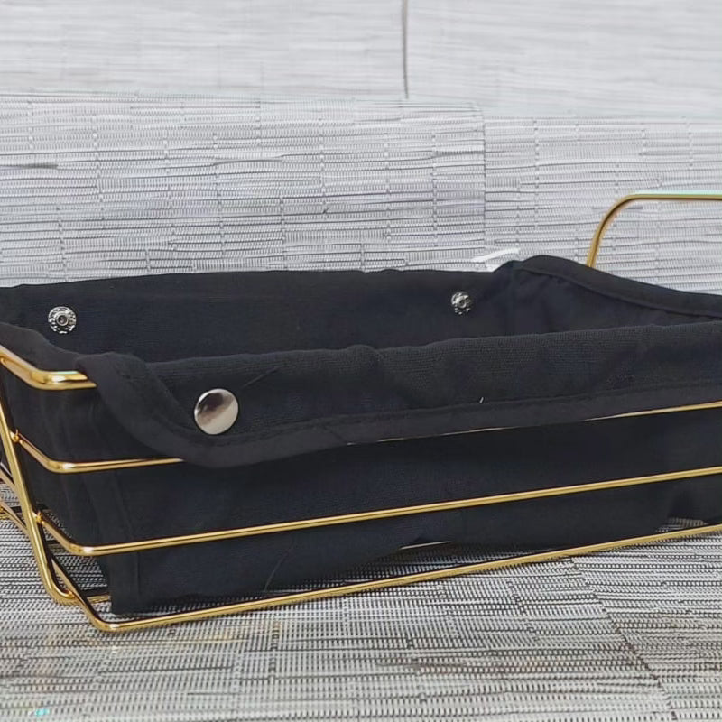 Panier de rangement en tissu noir avec cadre en or