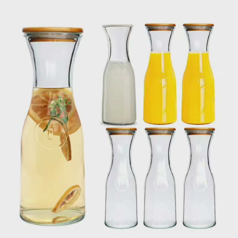 Bouteille en verre avec des couvercles en bambou