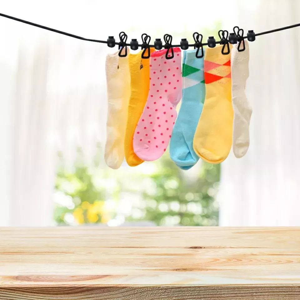 Ligne à linge portable résistant au vent extensible