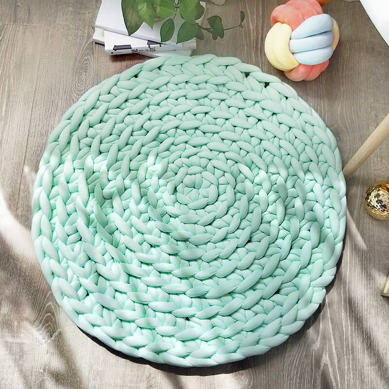 Tapis rond tricoté
