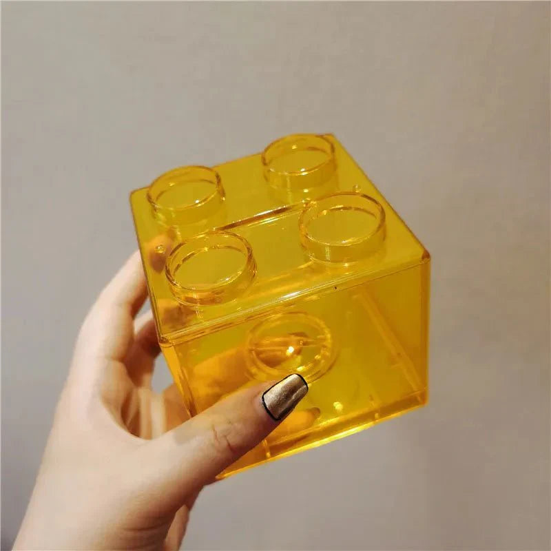 Tirelire translucide en blocs