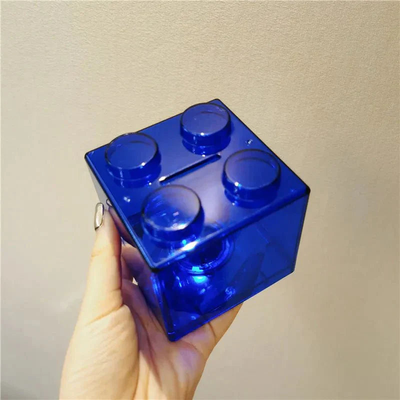 Tirelire translucide en blocs