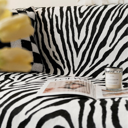 Couverture en chenille avec motif zèbre pour canapé/fauteuil