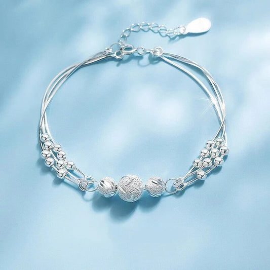 Bracelet en Argent Élégante avec Plusieurs Perles Brillantes