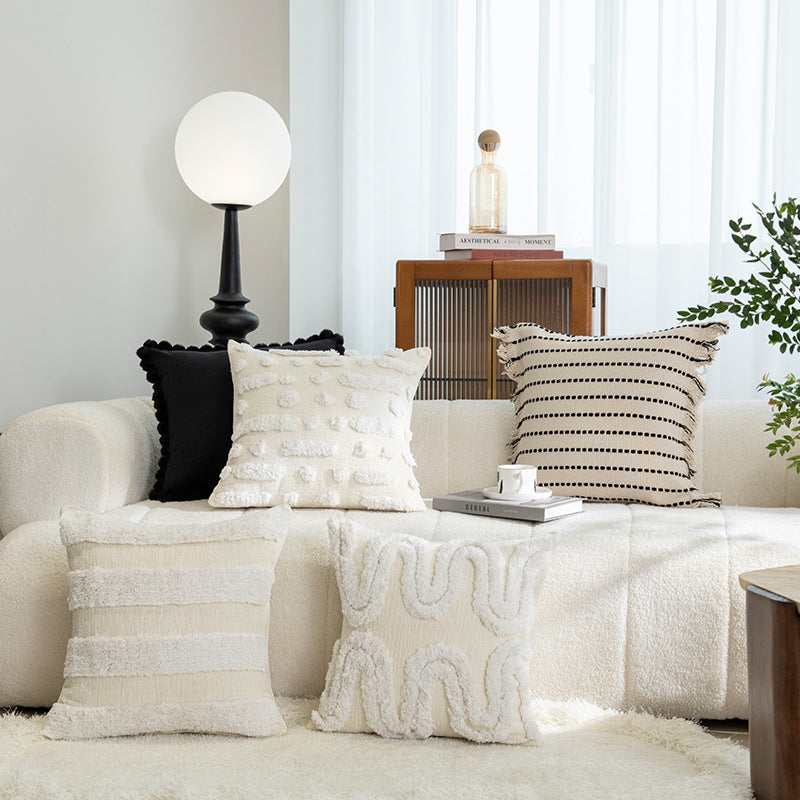 Coussin de lit crémeux romantique