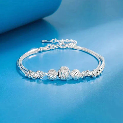 Bracelet en Argent Élégante avec Plusieurs Perles Brillantes