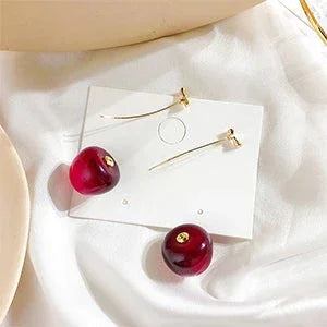 Boucles d'oreilles cerises rouges fleuries - Une touche d'élégance