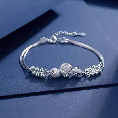 Bracelet en Argent Élégante avec Plusieurs Perles Brillantes