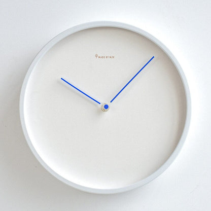 Horloge murale minimale Floroux