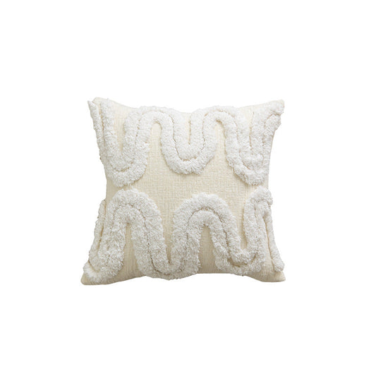 Coussin de lit crémeux romantique