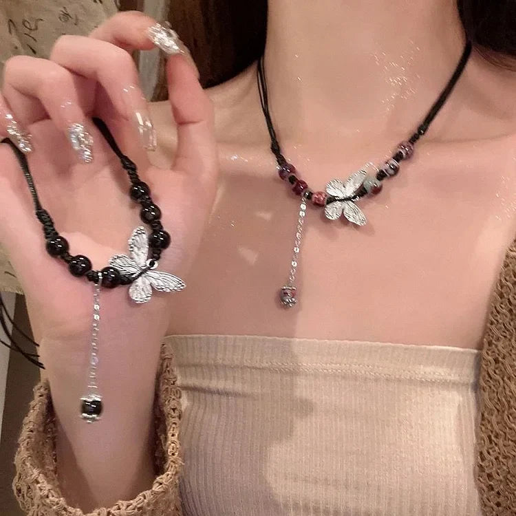 Aurora Papillon et Perle Collier - Une Élégance Envoûtante
