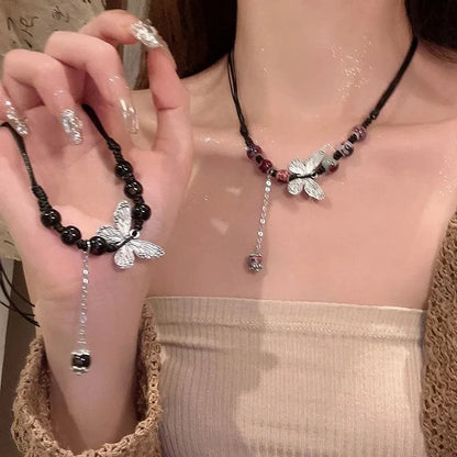 Aurora Papillon et Perle Collier - Une Élégance Envoûtante