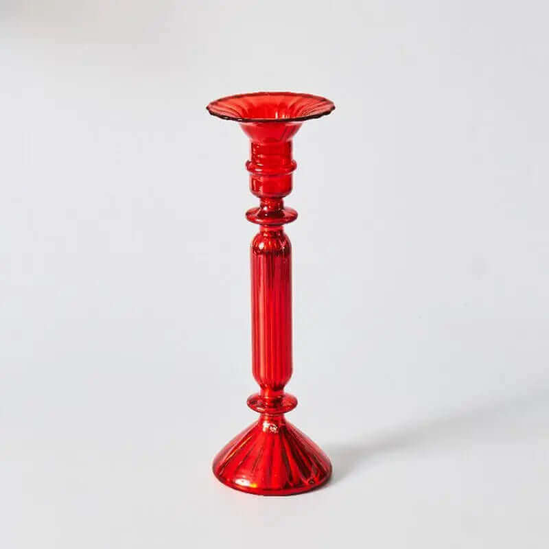 Belle collection de porte-bougies en verre rouges