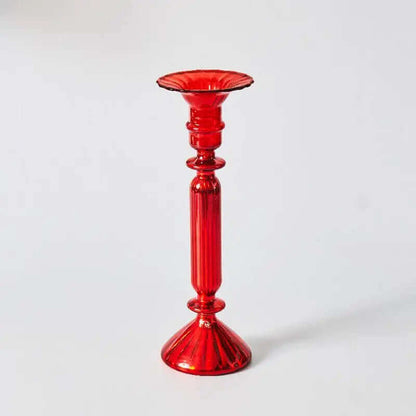 Belle collection de porte-bougies en verre rouges