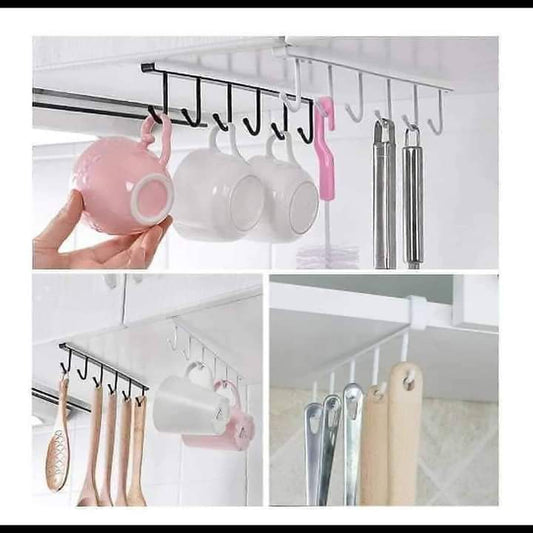 Au-dessus du placard support de tasse/couverts/attaché-case