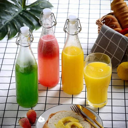 Bouteilles en verre à boisson avec couvercles à clip