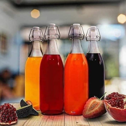 Bouteilles en verre à boisson avec couvercles à clip