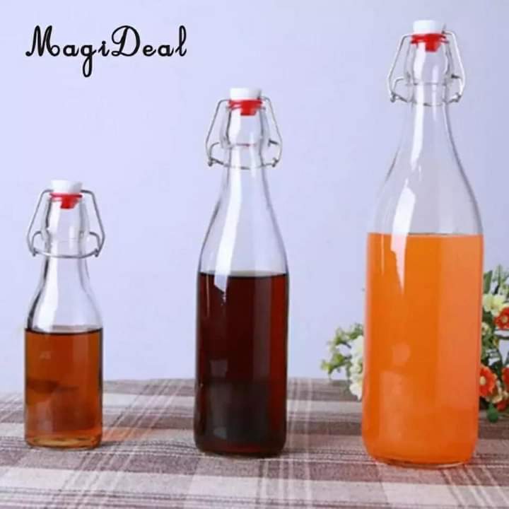 Bouteilles en verre à boisson avec couvercles à clip
