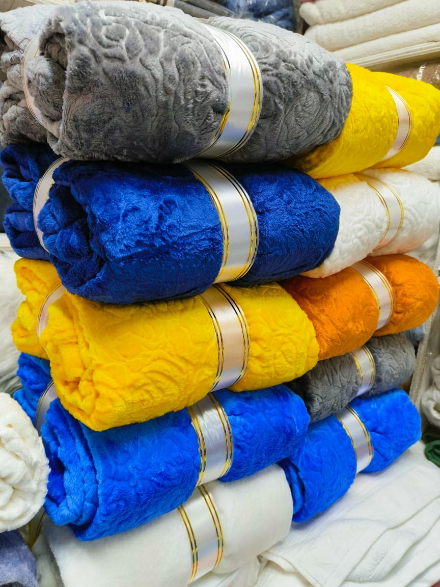 Couverture en polaire corail