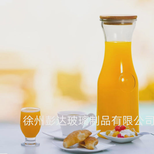 Bouteille en verre avec des couvercles en bambou