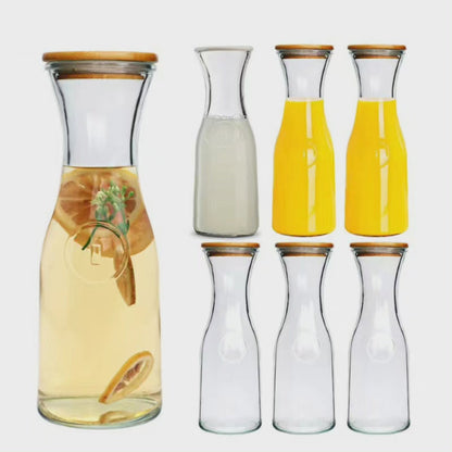 Bouteille en verre avec des couvercles en bambou