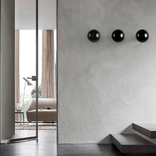Floroux – Lampe orb métallique sculpturale
