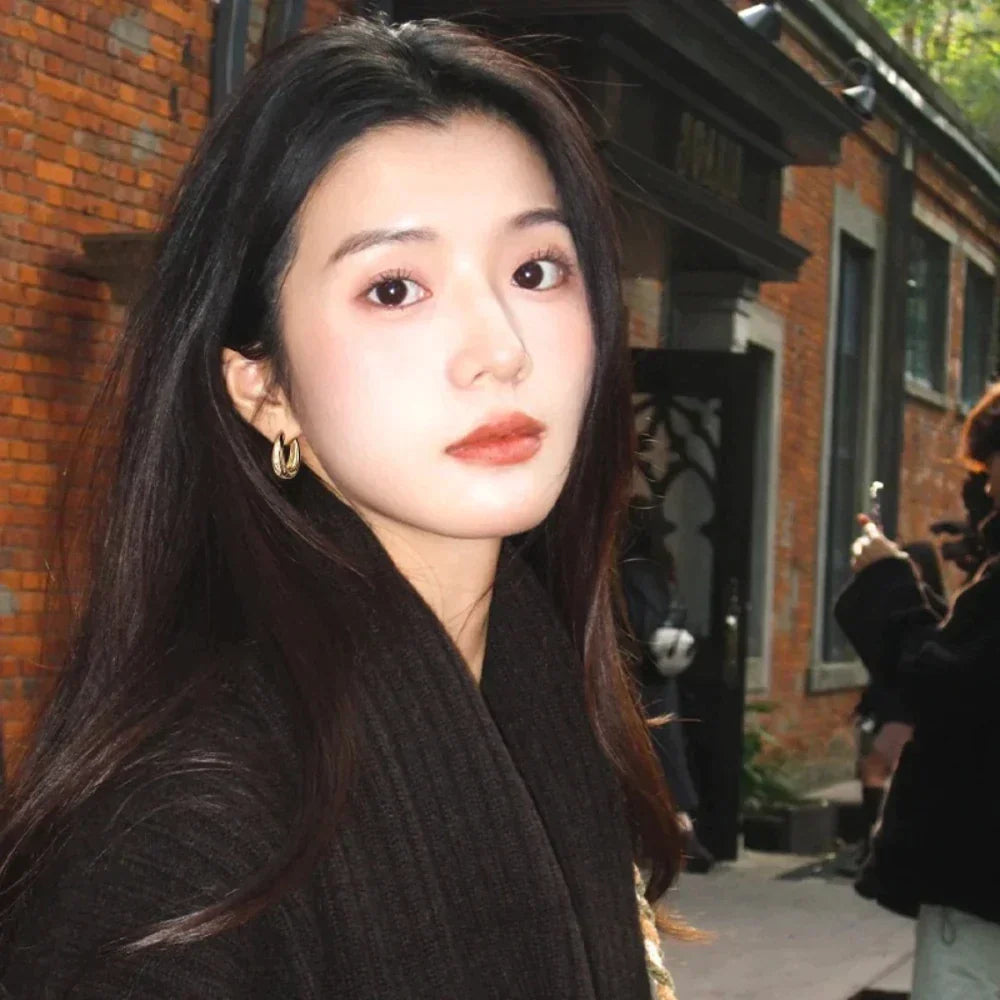 Boucles d'oreilles dorées élégantes au design classique