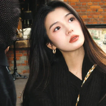 Boucles d'oreilles dorées élégantes au design classique