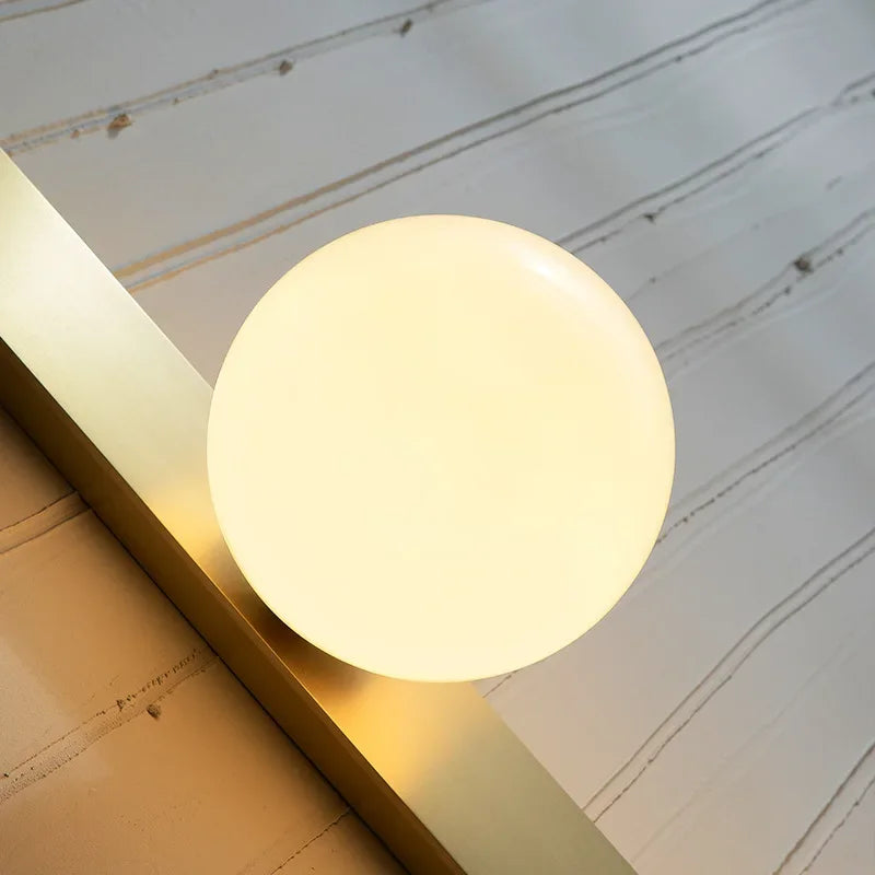 Floroux – Applique murale avec globe en verre doré
