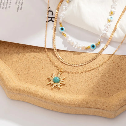 Ensemble de colliers EthnoCharm – Accessoires Tournesol & Oeil Malin