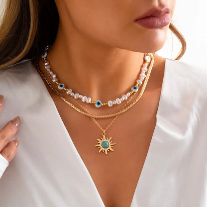 Ensemble de colliers EthnoCharm – Accessoires Tournesol & Oeil Malin