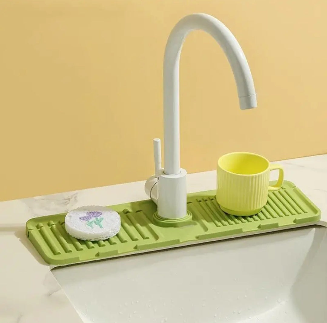 Tapis en silicone pour robinet