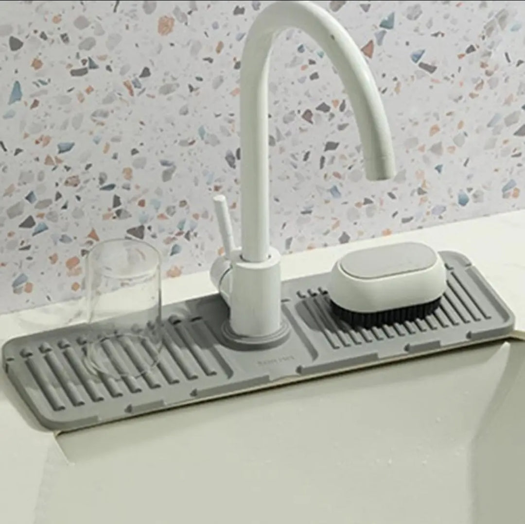 Tapis en silicone pour robinet
