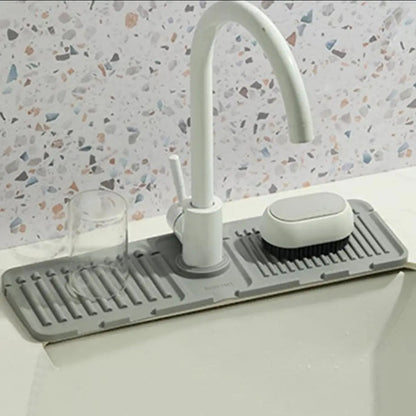 Tapis en silicone pour robinet