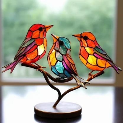 Figures d'oiseaux en verre teinté
