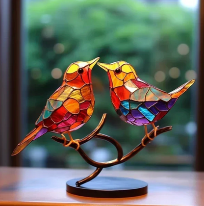 Figures d'oiseaux en verre teinté