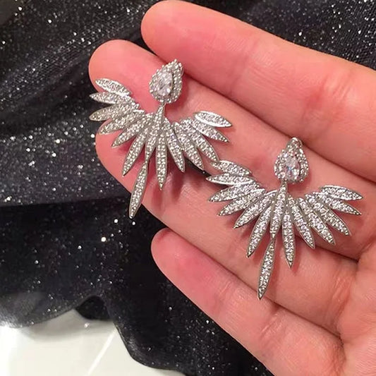 Boucles d'oreilles élégantes Celeste en argent avec ailes d'ange