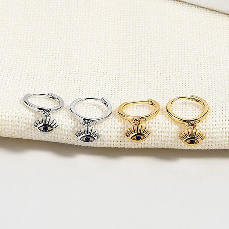 Boulettes D'oreilles Chic en Or/Argent avec un Envoûtant Oeil Maléfique - Collection Noa