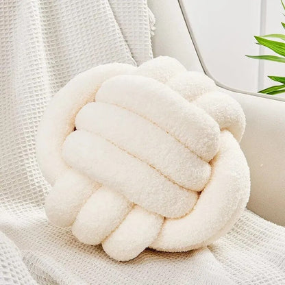 Coussin en forme de balle en peluche décoratif et noué en tissu doux