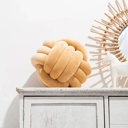 Coussin décoratif et doux avec boule nouée en cuir suédé