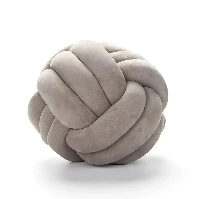 Coussin décoratif et doux avec boule nouée en effet daim